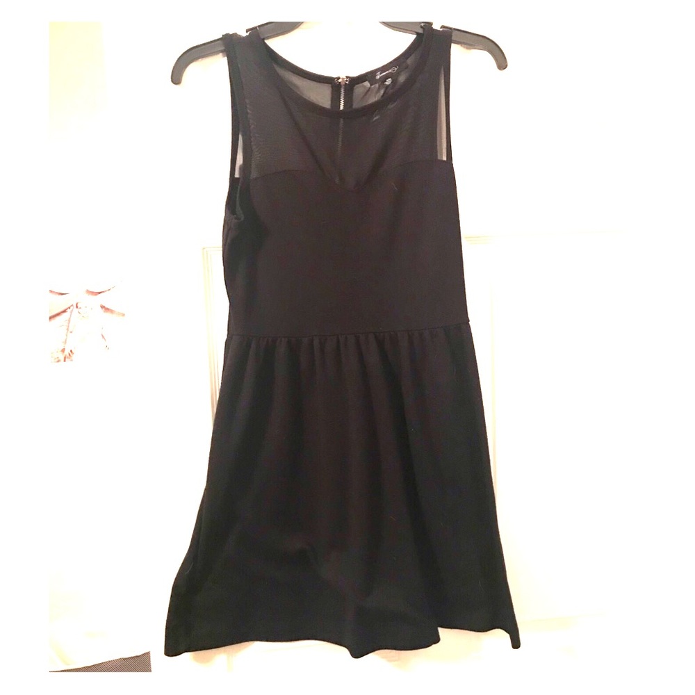 Black sleeveless shear neckline dress
